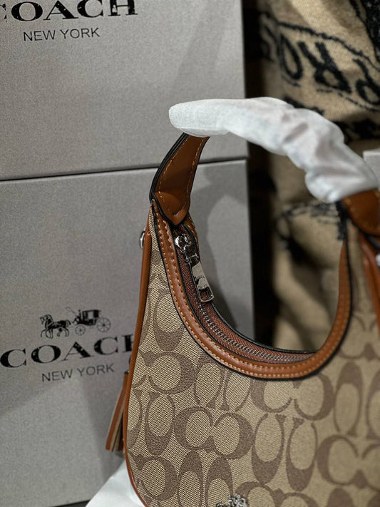 Sac hobo Teri en toile exclusive Marron